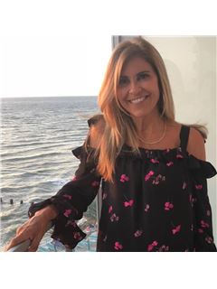 Kim Doukas - RE/MAX Champions