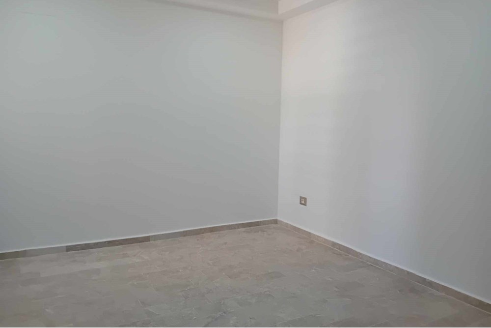 A vendre appartement S+2 rez-de-chaussée la soukra