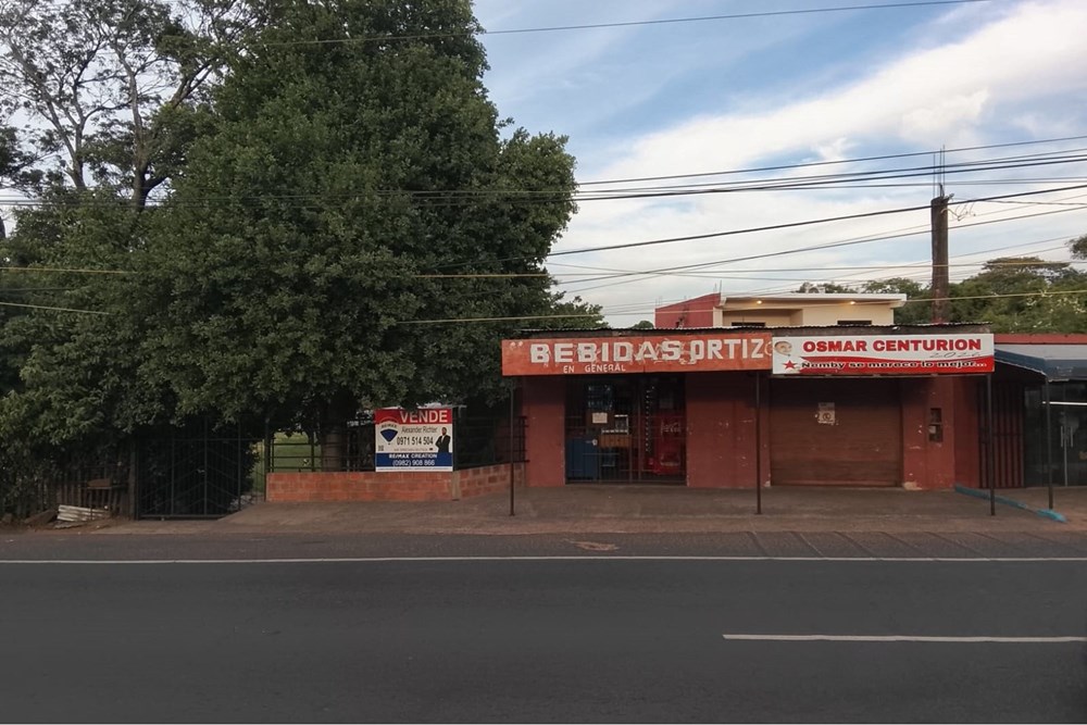Terreno de 1.579 m² con 15 m de frente directo sobre Acceso Sur en Ñemby, zona de alto tráfico. Incluye dos locales come — foto 2