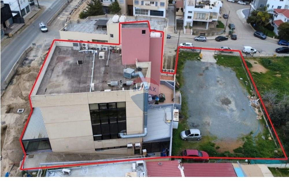 Commercial Building and Plot - More