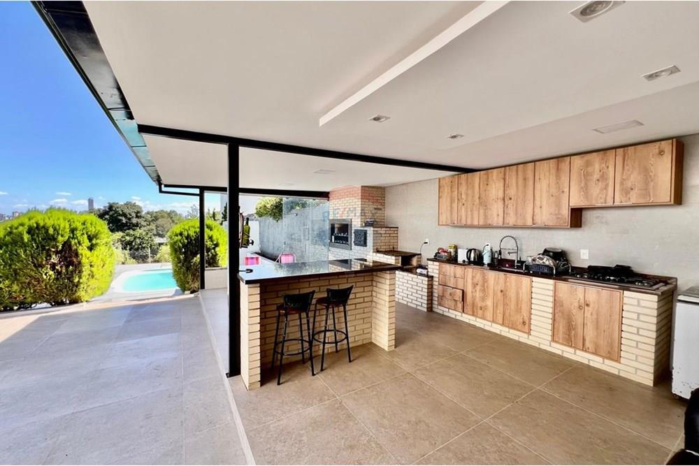 CASA EM PASSO FUNDO 3 SUÍTES (DORMITÓRIOS) COM PISCINA E QUIOSQUE NO BAIRRO PETRÓPOLIS — foto 1