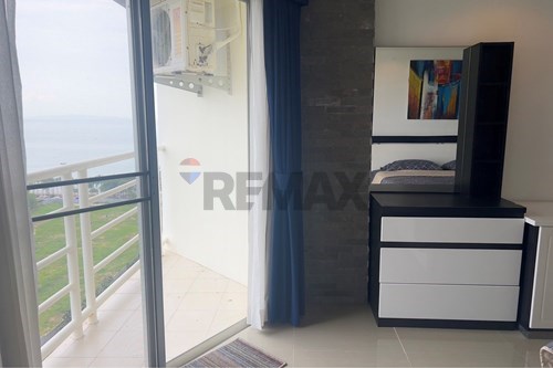 Beachfront 1BR Condo with Stunning Sea Views! photo
